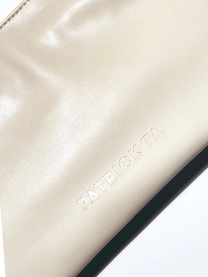 THE ELEVATED BEAUTY BAG IN CREAM